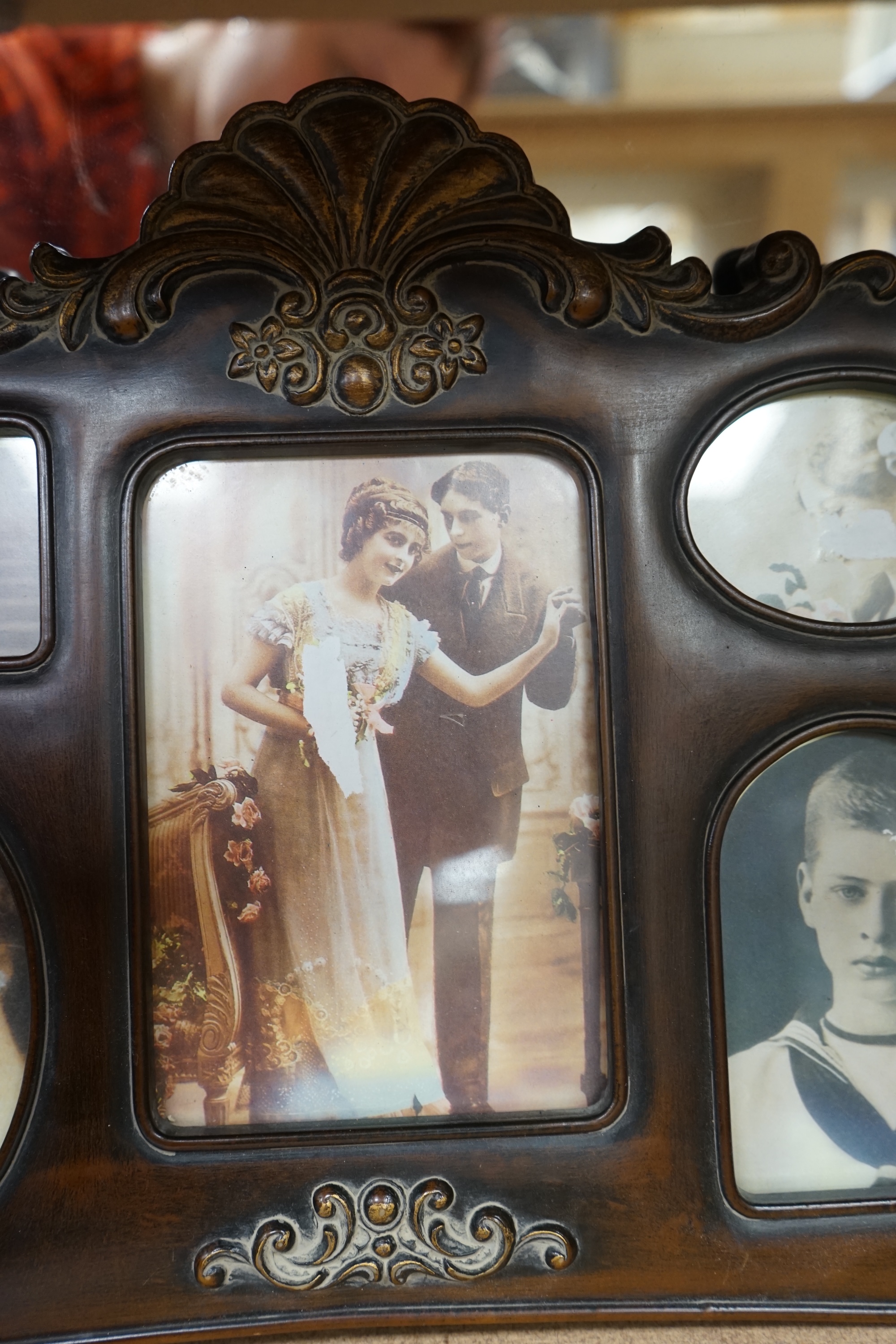 An Edwardian style multi photo frame and butterfly wing tray, 51cm wide. Condition - fair